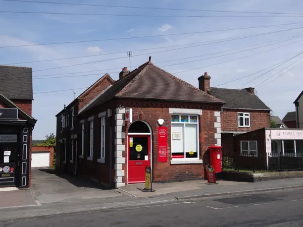 Prime Position Post Office on Main Road within large village